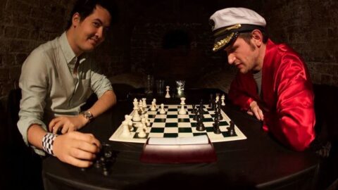 David Howell playing Chris